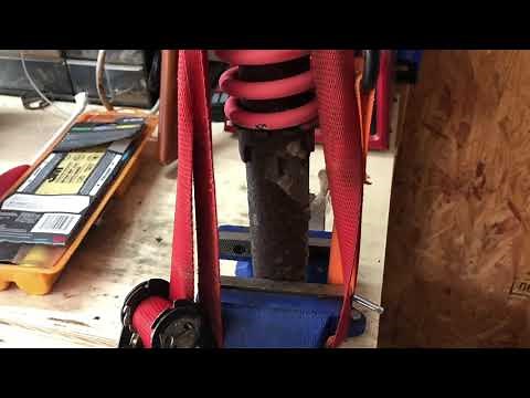 How to disassemble an atv shock absorber