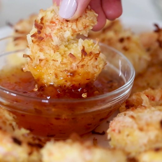 https://www.skinnytaste.com/skinny-coconut-shrimp/ These Easy Baked Coconut Shrimp are crisp, golden and delicious served a sweet and spicy apricot dipping sauce. Set these out on a platter in front of some hungry guests and I guarantee they will disappear!! | Skinnytaste