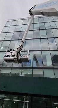 Lifting New Large Window Glass Panels with Boom Lift Using FREE PowerLift System by Alpha Platforms