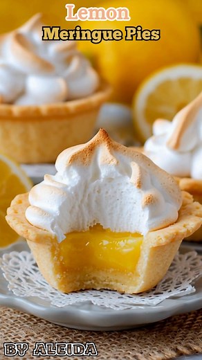 These adorable mini Lemon  Meringue Pies are impossible to resist!...