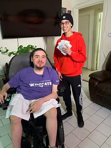 14K views · 306 reactions | His mobility rests on the strength of just a few fingers due to a muscle disorder that’s getting progressively worse. But just when Carlos faced one of his worst moments, Ty stepped in to help. Now, he’s rewarding her with a $1,000 surprise. Watch the shock, tears-- and be sure to leave Ty and Carlos a message here! | Ryan Wolf | Facebook