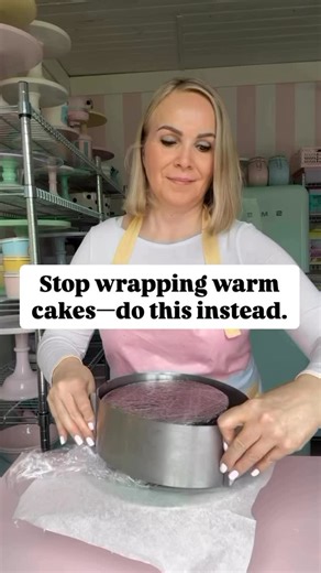 Stop wrapping warm cakes—do this instead. You’ve probably seen videos online where people wrap their cake in plastic wrap right after baking to lock in the moisture. And yes—it can work. But it also often traps too much steam and can make your cake soggy. Here’s what I do instead: I place a piece of parchment paper on a wire rack, sprinkle a tablespoon or two of sugar on top, and as soon as the cake is done baking—no delay—I flip it straight onto the parchment. The sugar gently absorbs the steam