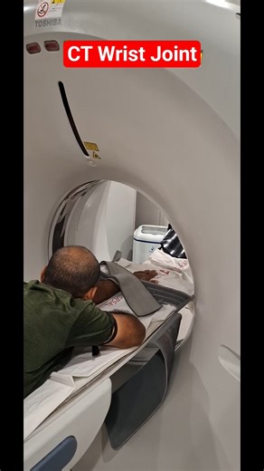 CT wrist positioning