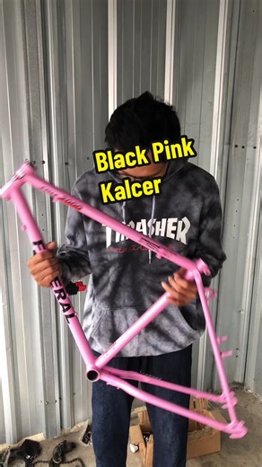 Explore the Black Pink Kalcer Commuter Bike