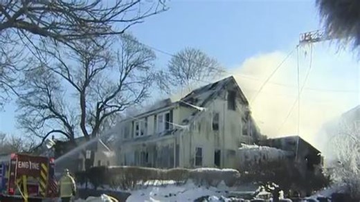 Crews brave extreme cold to battle large house fire in Quincy