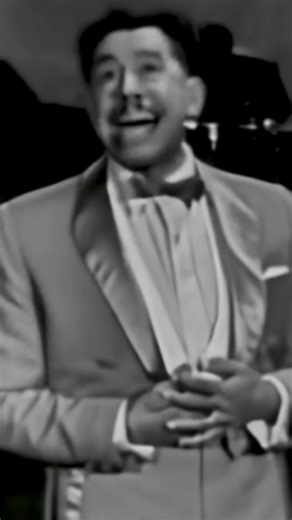“Minnie the Moocher” is Cab Calloway’s most iconic song — a jazz classic that defined the swing era and made him one of the most charismatic bandleaders of the 1930s. Released in 1931, it tells the story of Minnie, a “low-down hoochie coocher” who falls in with bad company and meets a tragic end. Beneath its playful surface, the song reflects the jazz-age underworld — filled with slang, nightlife, and moral lessons dressed in rhythm and humor. With its swinging rhythm, lush brass, and theatrical