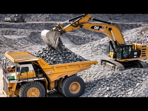 Caterpillar Excavator Loading BelAZ Dump Trucks | Heavy Mining Equipment in Action