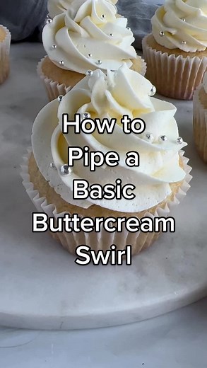 How to pipe a basic buttercream swirl! #baking101 #piping #pipingbuttercream #bakingtutorial #bakingtutorialvideo #bakingtips #wilton #wilton1m #wiltontip