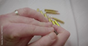 Loading a gun magazine