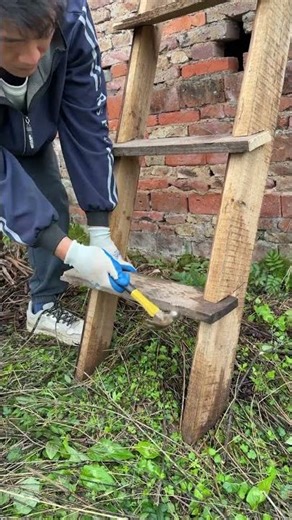 Old ladder renovation: reinforcing treads with a hammer