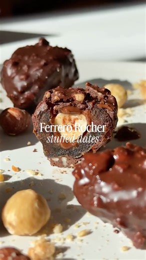 Megan Murphy on Instagram: "Ferrero Rocher Stuffed Dates 🌰 ep. 17 of my stuffed date series: all the chocolatey, hazelnutty goodness of the classic candy with a better-for-you twist and so perfect for valentine’s day! Recipe: 6 medjool dates 6 tbsp chocolate hazelnut butter 6 whole hazelnuts ½ cup @enjoyjustdate dark chocolate chips ¼ cup crushed hazelnuts Stuff each pitted date with 1 tbsp chocolate hazelnut butter, then press a whole hazelnut into the center. Freeze 1–2 hrs until firm. Melt t