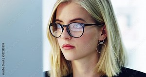 Working, web computer research of a serious, thinking business woman planning seo strategy. Digital marketing and website erp worker working and coding big data and cloud computing for an IT company