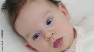 Close up view of baby's face in 4k slow motion 60fps in 4k slow motion 60fps
