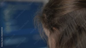 Teenage Girl Develop Programming Skills. Program Coding Screen on Computer Screen. Young Women Software Developer Using Computer to Write Code. Programmer development. Child is Learning Programming.