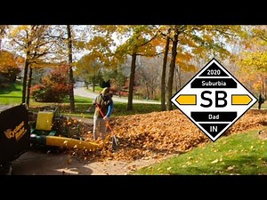 Clearing a Big Pile of Leaves on my Driveway with the Cyclone Rake and John Deere 648R #lawncare