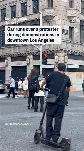 Video shows car drive into group of protesters in Los Angeles