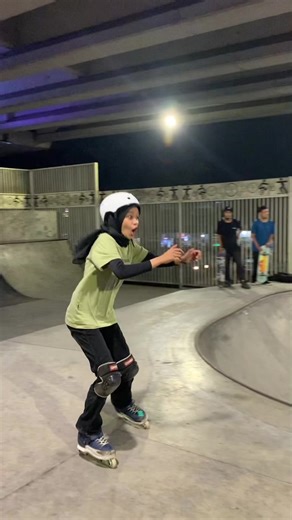 Rollerblading Tricks in Indoor Skate Park