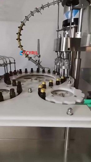 Fully automatic filling and capping machine. Small glass bottle #fillingmachine #cappingmachine | Henan Cyril Machinery Equipment Co.,LTD
