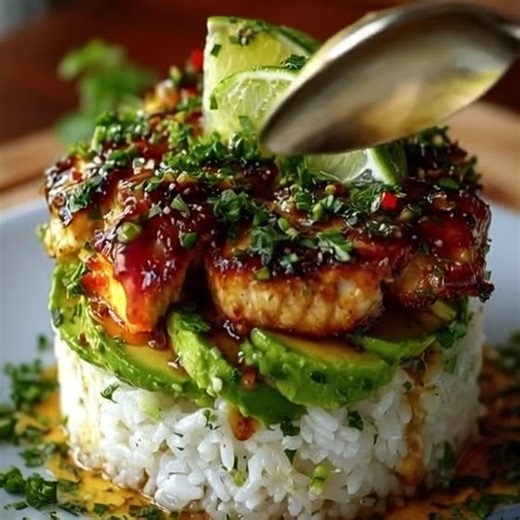 Honey Lime Chicken and Avocado Rice Stack Ingredients : For the Chicken 2 boneless, skinless chicken breasts (sliced into strips) 2 tbsp honey 2 tbsp soy sauce 2 tbsp fresh lime juice 1 tsp lime zest 1 tbsp olive oil Salt and pepper, to taste For the Rice Stack 2 cups cooked jasmine rice 1–2 ripe avocados (sliced) Fresh lime wedges (for garnish) 2 tbsp fresh chopped cilantro or chives 1 tsp sesame seeds (optional) Instructions : Marinate the Chicken In a bowl, whisk together honey, soy sauce, li