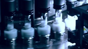 Premium stock video - Medical vials on pharmaceutical manufacturing line. quality control technology