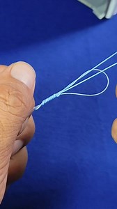 The perfect braid to mono knot is demonstrated, making it easy for beginners to transition between these popular fishing lines. Learn how to tie this knot securely, preventing line breakage and ensuring a successful fishing experience | Indra Jaya Giri