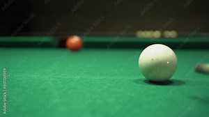 Billiards game, pool table, cue hammers the ball into the hole, snookers game process