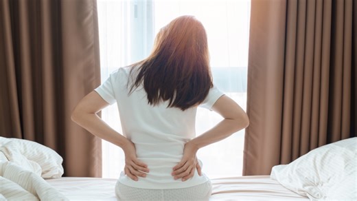 How To Sleep With Lower Back Pain, Plus the Sleeping Positions That Reduce Pressure on Your Spine