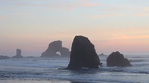 Layers of soft colors and mist illuminate off shore sea stacks during these magical moments from Ecola State Park in Cannon Beach on the North Oregon Coast. Enjoy this week's Wave Therapy Wednesday video feature and have a great day, Coast Explorers! | Oregon Coast Explorer