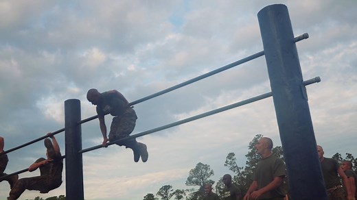 Recruits with Kilo Company, 3rd Recruit Training Battalion, complete the obstacle course aboard Marine Corps Recruit Depot Parris Island, S.C., June 9, 2021. This course is used as one of many physical training challenges to prepare recruits to become United States Marines. (U.S. Marine Corps video by Lance Cpl. Randall D. Whiteman) | Marine Corps Recruit Depot Parris Island, S.C.