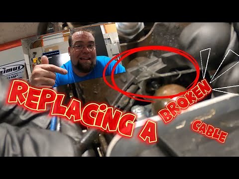 Replace a throttle cable in a Stihl FS 85 RX trimmer. Fix damaged wiring harness and install new.