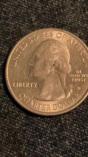 Close-Up Examination of a Quarter-Dollar Coin