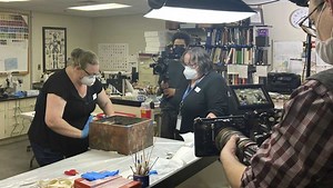 Experts pull documents, money from second time capsule found near old Robert E. Lee statue site