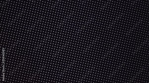 Close-up of the LCD screen pixels. Abstract background. Close the color-coded LED display. RGB pixels on a TV while a movie is being shown. Red, blue and green subpixels create an image on the screen