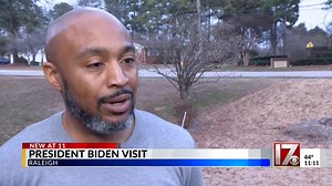 President Joe Biden stops at a local fast food restaurant in a recent visit to Raliegh, North Carolina, then meets a Black teacher who recently had his student loans forgiven at his home. | The Intersection of Madness & Reality