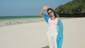 Beautiful Woman Waving Camera Standing On Stock Footage Video (100% Royalty-free) 5656958 | Shutterstock