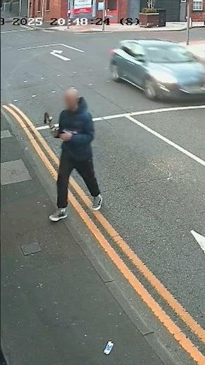 CCTV footage of a suspected attempted murder incident in Armagh shows a man lighting a petrol bomb