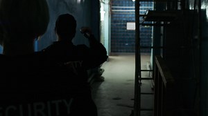 Female safety guards with flashlight in a warehouse | Free Stock Video Footage