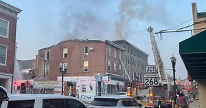 Three-alarm fire spreads to historic Howard Hotel in Elkton
