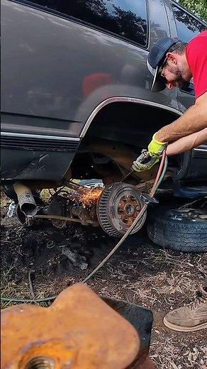 Time-lapse removing Chevy Tahoe rear axle assembly the Salvage yard way