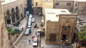 CAIRO, EGYPT - DECEMBER 21, 2017: The view from Bab Zuwayla gate on Al Khayama street with Tentmakers alley (Sharia Khayamiya), old mosques and mansions, on December 21 in Cairo, Egypt.
