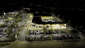 clip-3423858707-parking-nighttime-many-parked-cars-dark-carpark