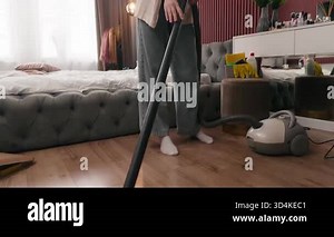 Happy Caucasian woman with vacuum cleaner in bedroom smiling female homeowner cleaning dirty floor girl housemaid housewife householder satisfied vacuuming home with modern hoover cleansing disinfect Stock Video Footage - Alamy