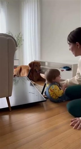 Child eats tv for breakfast while dog watches