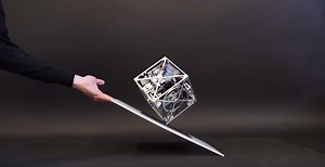 A Balancing, Walking Cube Named Cubli