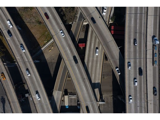 Biden Toughens China Curbs With AI Order, Smart Car Tech Ban