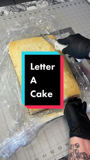 Delicious White Almond Cake with Vanilla Buttercream, Fruits, and Flowers