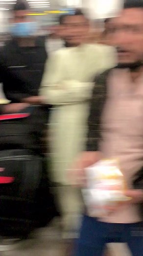 Traditional South Asian Attire at the Airport