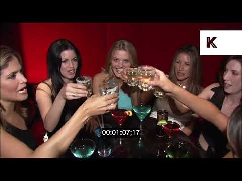 2000s USA Women Drinking Cocktails at Nightclub