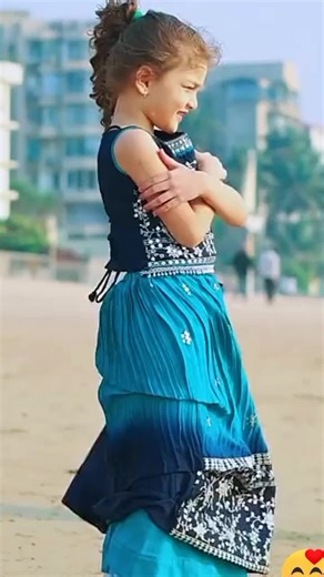 Young Love on the Beach: A Heartfelt Moment