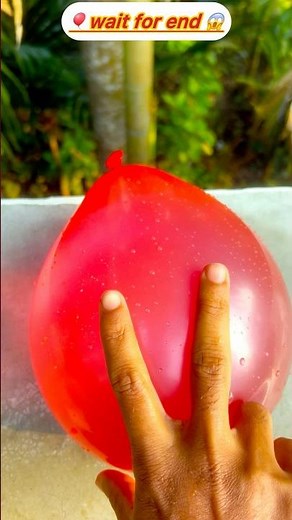 Watch This Water Balloon Explode from Above! 💥🎈 #BalloonDrop #FunScience #EpicMoment